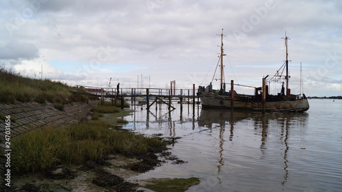 Old Wooden Yachts on Mud Flats in Essex