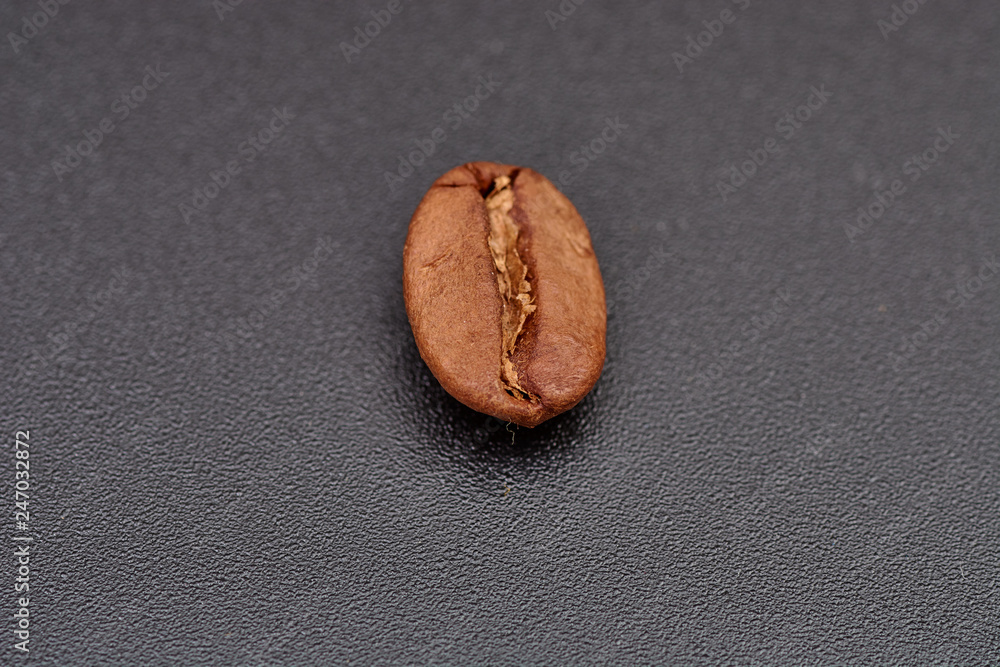 coffee beans on black background consistent with coffee beans on black background consistent with