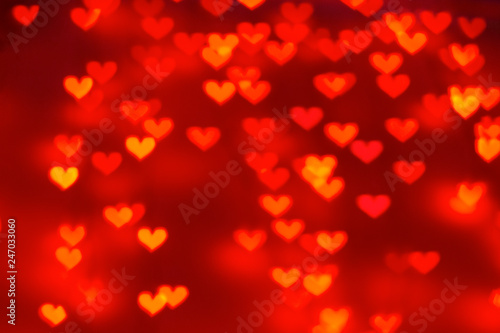 Small red hearts bokeh background