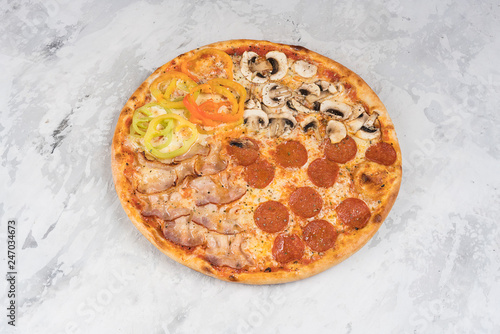 Italian pizza with two different flavors on a white background isolated top view of tasty and appetizing