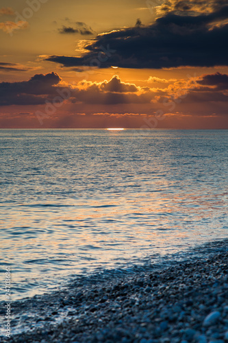 clouds in the sunset over the sea coast