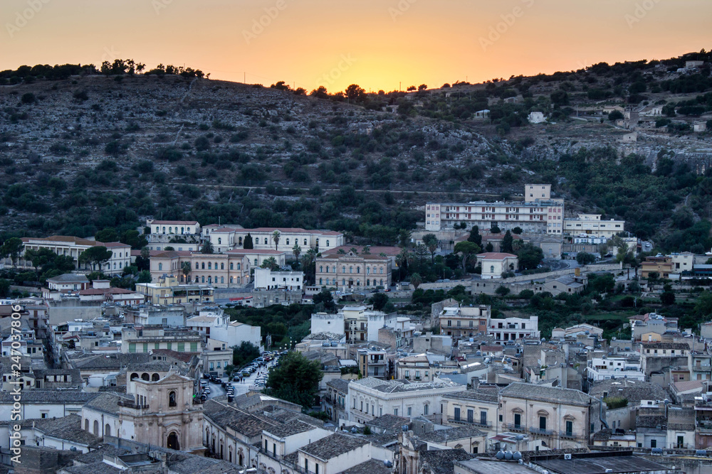 Scicli, Ragusa Ibla Sicily, Italy. Sicilian landscape at sunset, white stone buildings