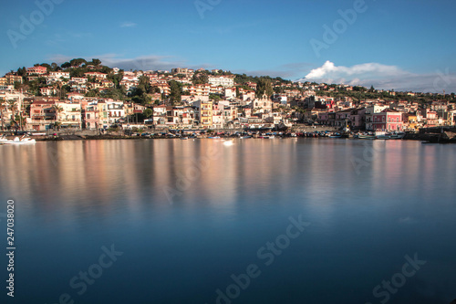 Splendid old fishing village in Sicily, Acitrezza with a view of the Volcano Etna