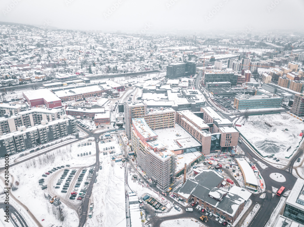 Incredible air view from drone of Oslo covered with snow, Norway 