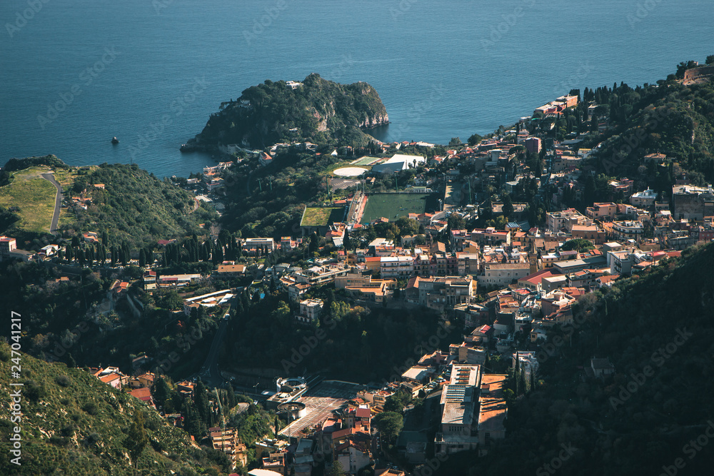 Beautiful landscape of Taormina, green hill from Castelmola Sicily