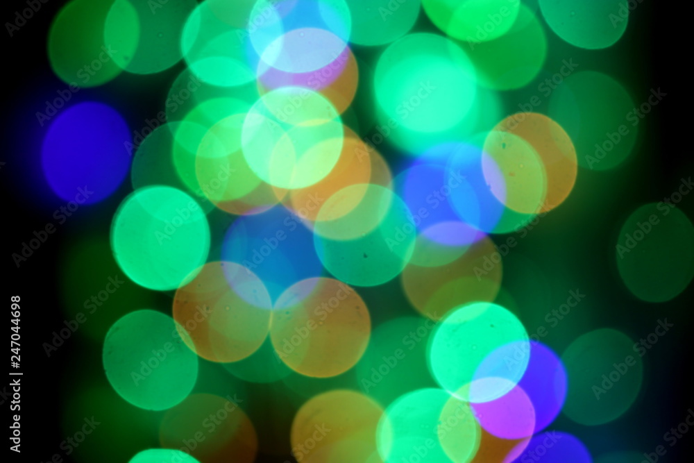 colorful bokeh, garland on a dark background