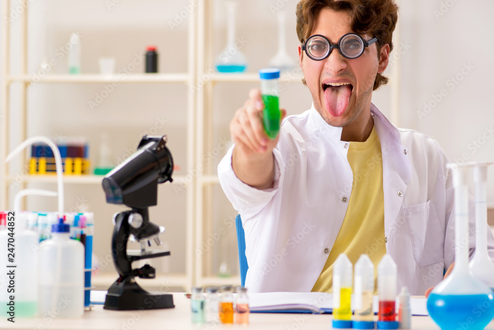 Funny crazy chemist doing experiments and tests Funny crazy chemist doing experiments and tests