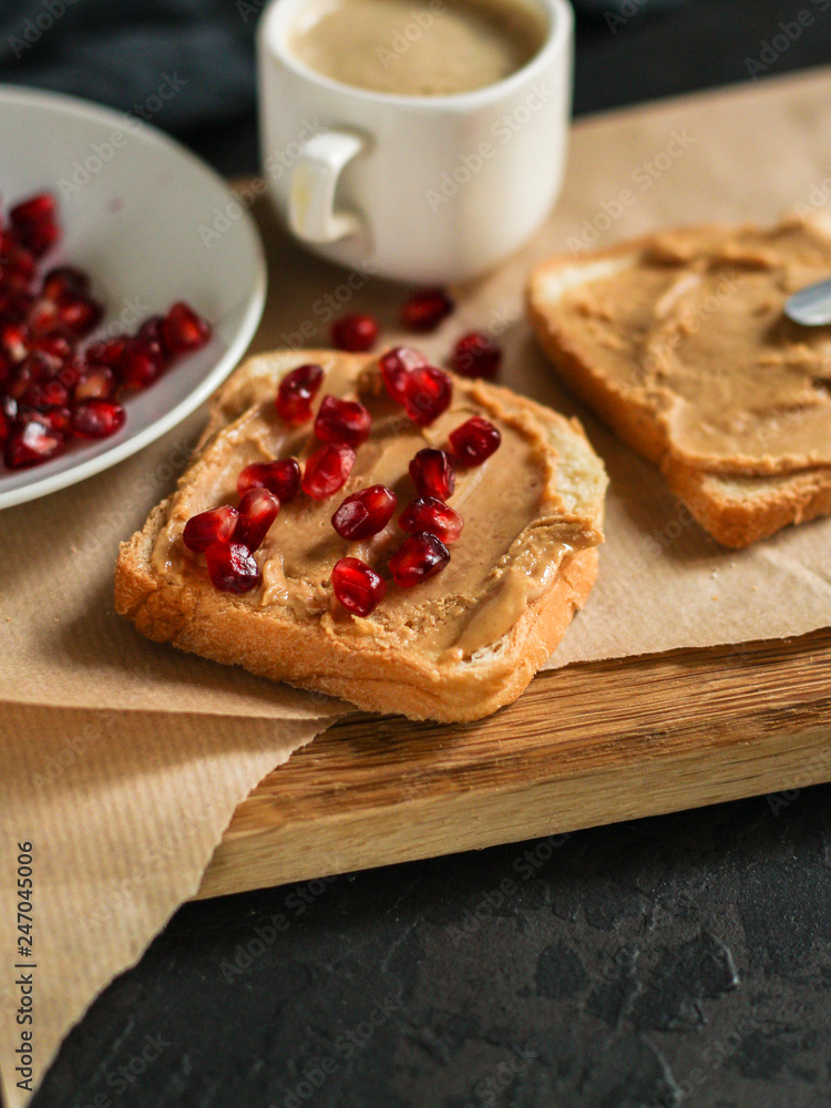 sandwich, pomegranate, peanut butter (sweet snack). Top Food background sandwich, pomegranate, peanut butter (sweet snack). Top Food background