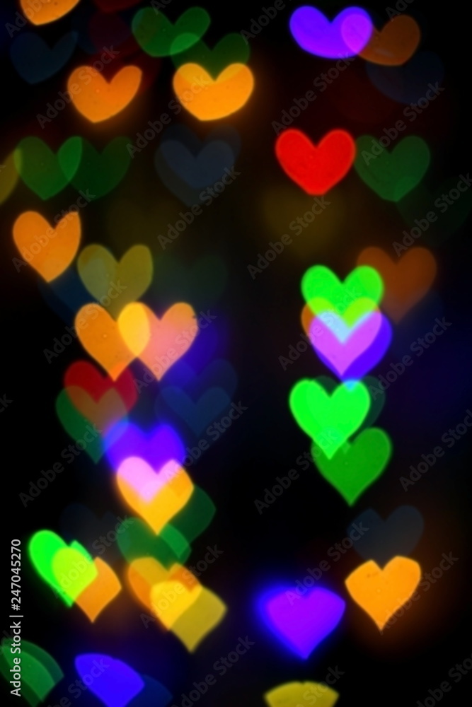 colorful bokeh in the shape of hearts colorful bokeh in the shape of hearts