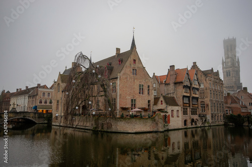 View from the boat, of the historical building on the sides of canal at Bruges 