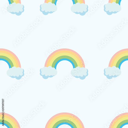 Cute rainbow pattern. Rainbow escaping from two clouds