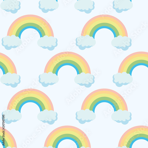 Cute rainbow pattern. Rainbow escaping from two clouds