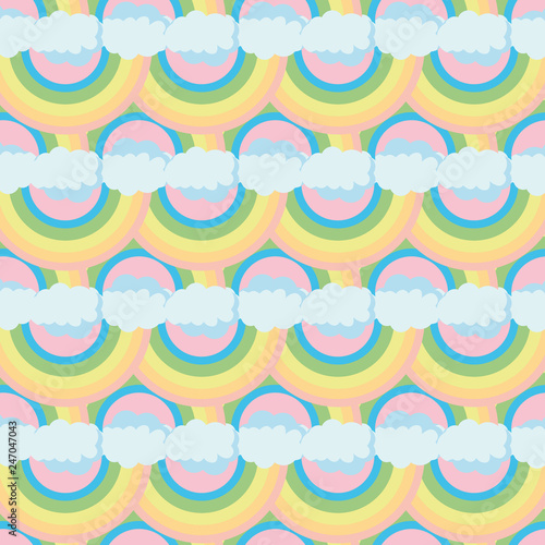 Cute rainbow pattern. Rainbow escaping from two clouds