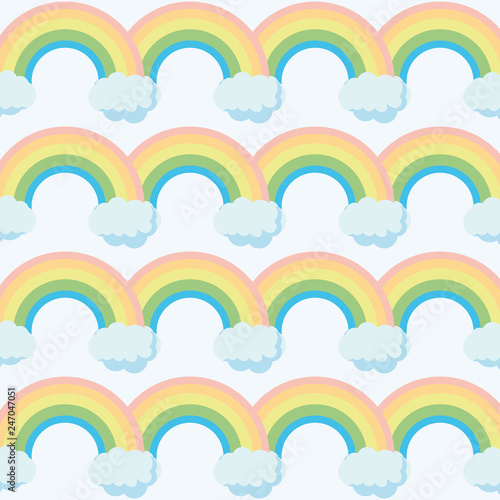 Cute rainbow pattern. Rainbow escaping from two clouds