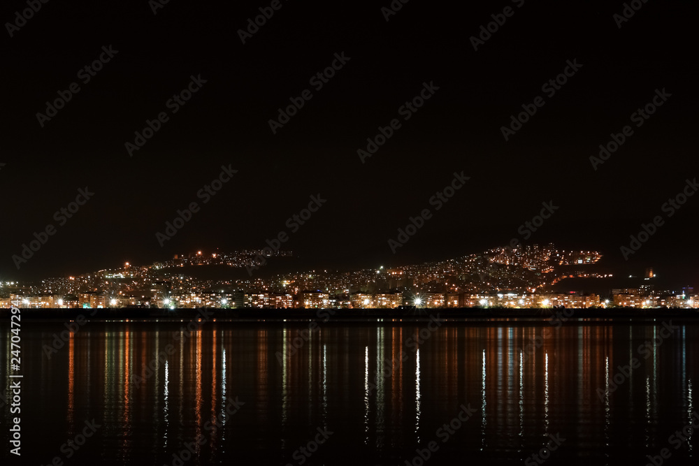 Panorama of the harbour and the city of Izmir at night.