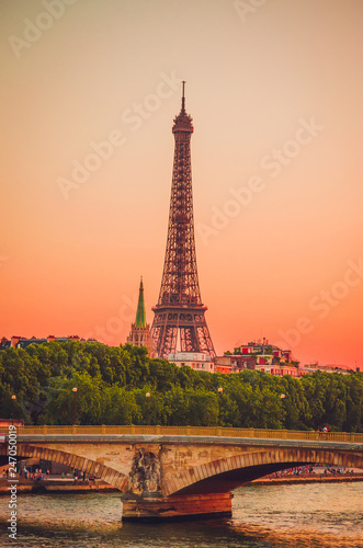 Sunset view of Eiffel Tower and river Seine in Paris, France.