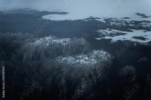 Sky, top down view of Mountains in Asturias with snow, Spain