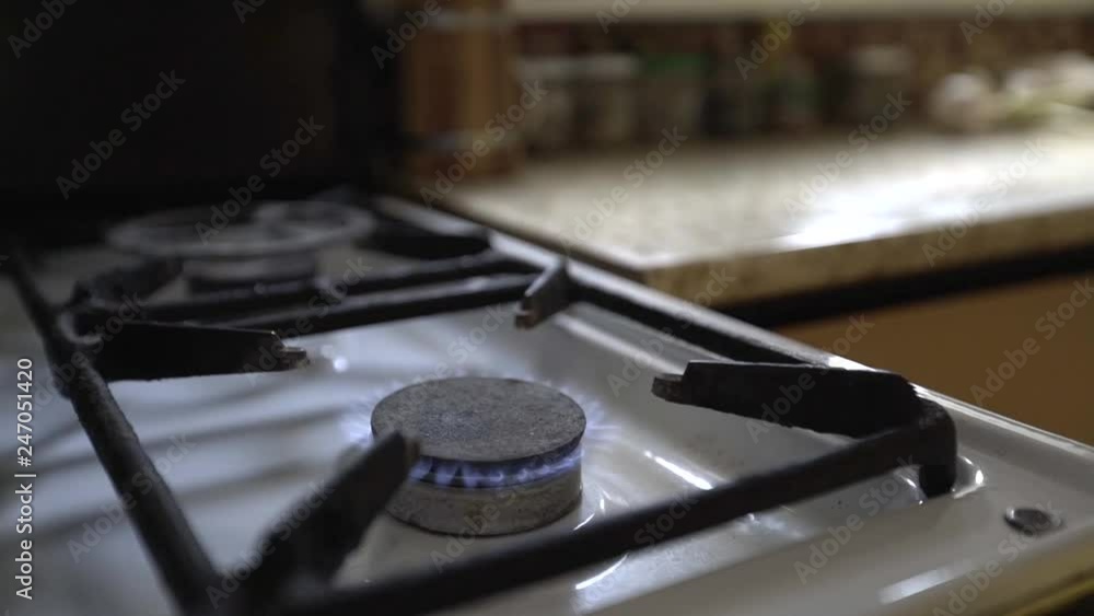 empty, clean gas stove, set fire to a gas burner using a gas stove