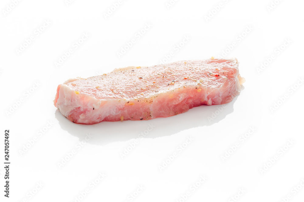 Raw pork meat on a white background Raw pork meat on a white background