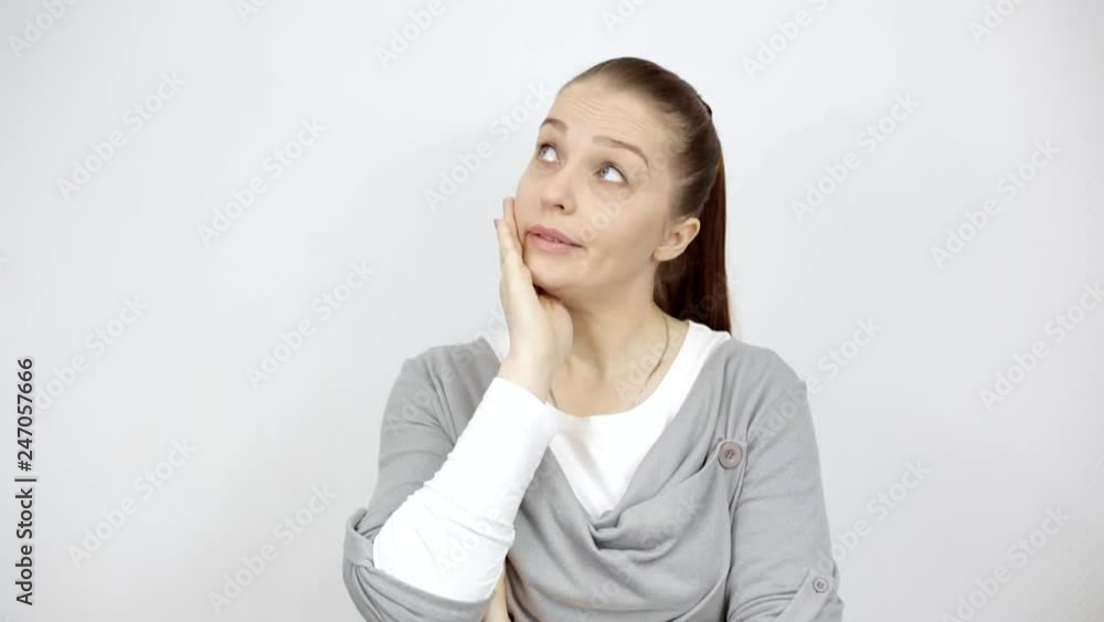 brooding and weary woman, the emotions of a man on a white background brooding and weary woman, the emotions of a man on a white background