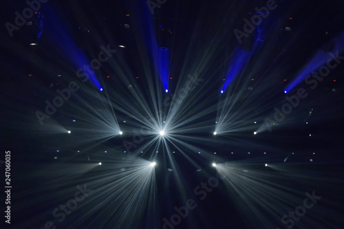 Сoncert lights. White and blue spotlights.