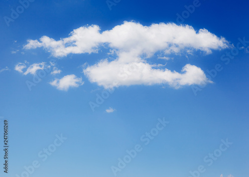 Fantastic view of the azure sky on a sunny day with fluffy clouds.