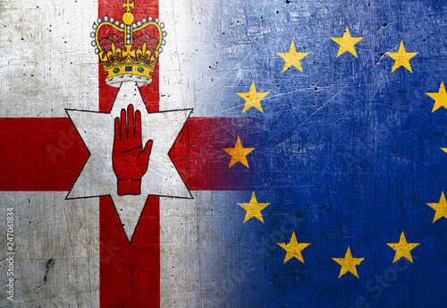 Northern Ireland and European Union flags on the grunge metal background