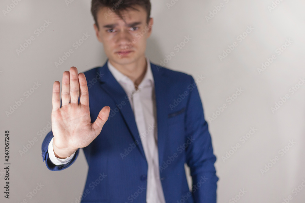 businessman with hand stopping the action. Stop in business concept. businessman with hand stopping the action. Stop in business concept.