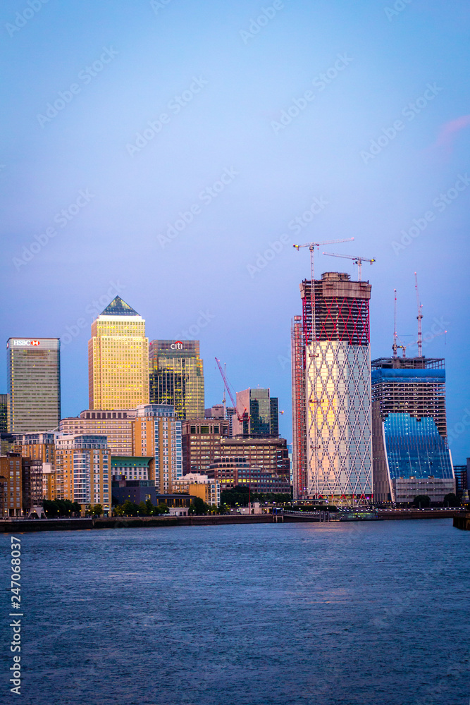 Fototapeta premium A view on the Thames River and Canary Wharf in London, UK