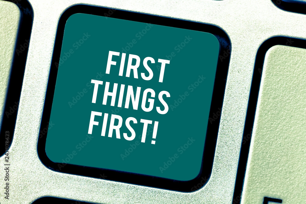 Fototapeta premium Word writing text First Things First. Business concept for important matters should dealt with before other things Keyboard key Intention to create computer message pressing keypad idea