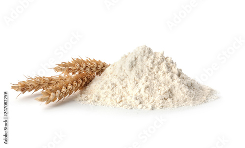 Foto Fresh flour and ears of wheat isolated on white