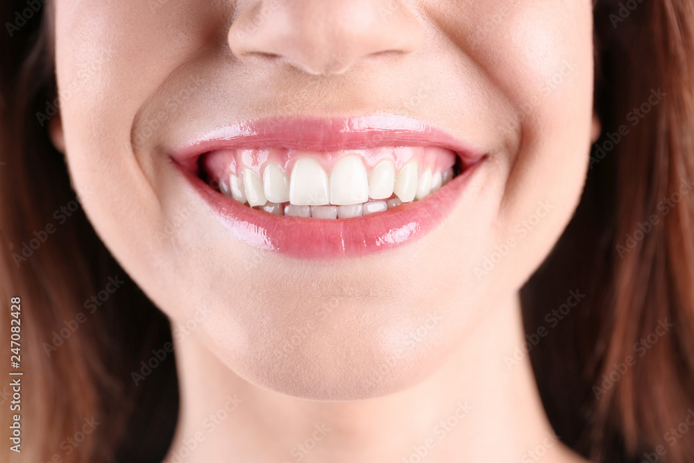 Young smiling woman with healthy teeth, closeup Young smiling woman with healthy teeth, closeup