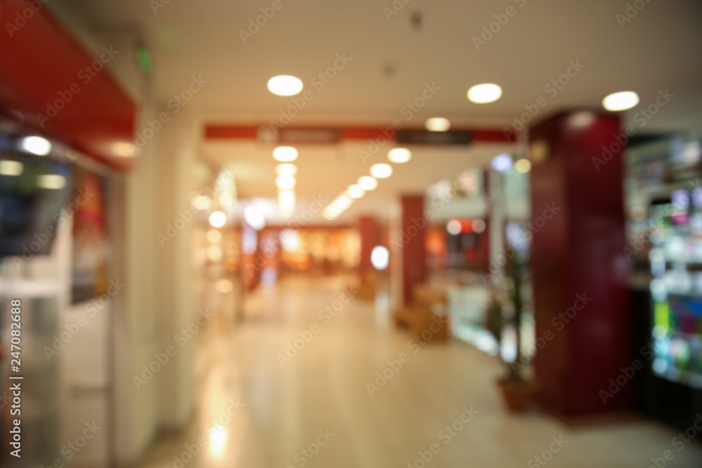 Blurred view of modern shopping mall interior Blurred view of modern shopping mall interior