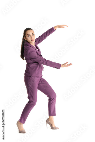 Businesswoman with magnet attracting people on white background