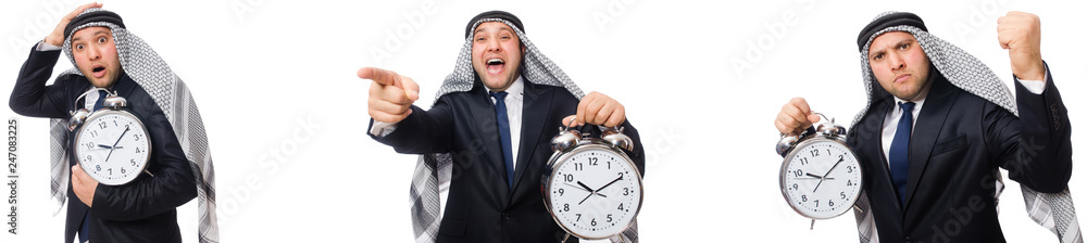 Arab businessman with alarm-clock in time management concept Arab businessman with alarm-clock in time management concept