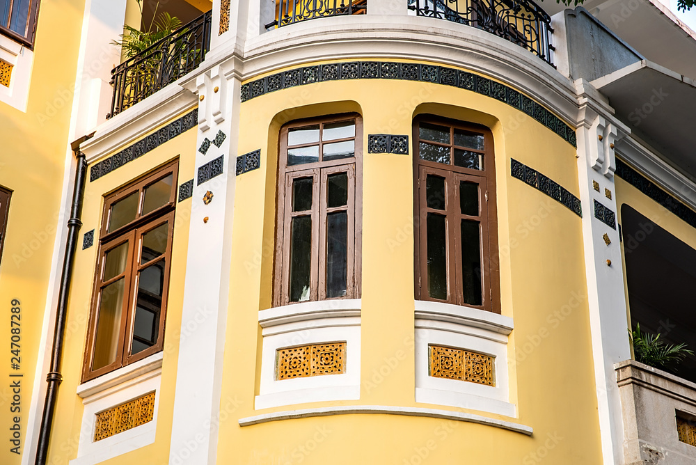 Naklejka premium Beautiful windows of the old house in the tourist area of Shamian, Guangzhou
