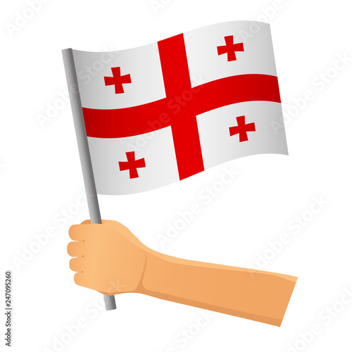 Georgia flag in hand