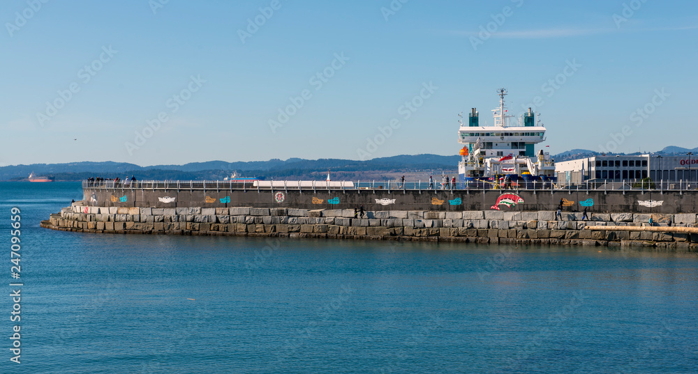 View of Ogden Point Breakwater, a popular walk near Canada's busiest deep water port facility, taken in Victoria, British Columbia, Canada.
