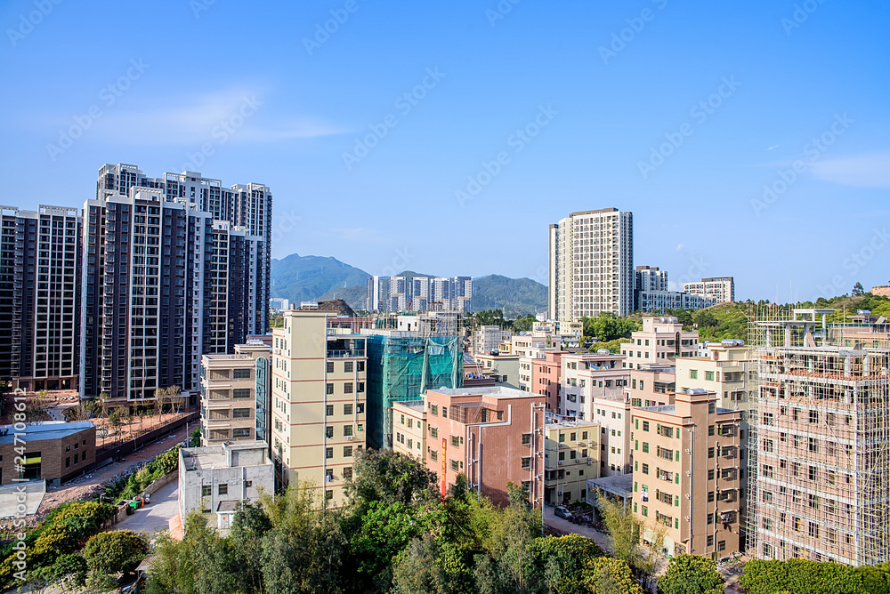 Fototapeta premium Real Estate Building and Chengzhong Village Building, Daya Bay District, Huizhou City, Guangdong Province
