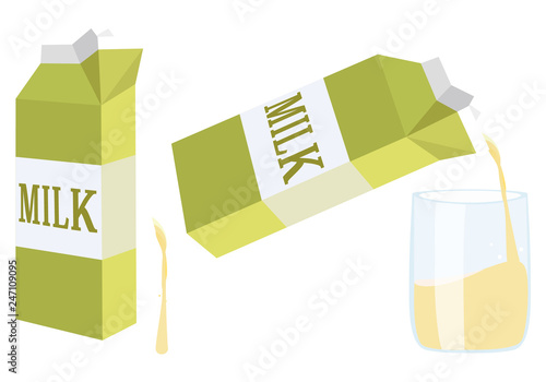 黄色い牛乳パックと注がれるコップ Milk carton. Cup of milk