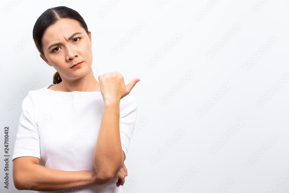 Angry woman standing isolated over white background Angry woman standing isolated over white background