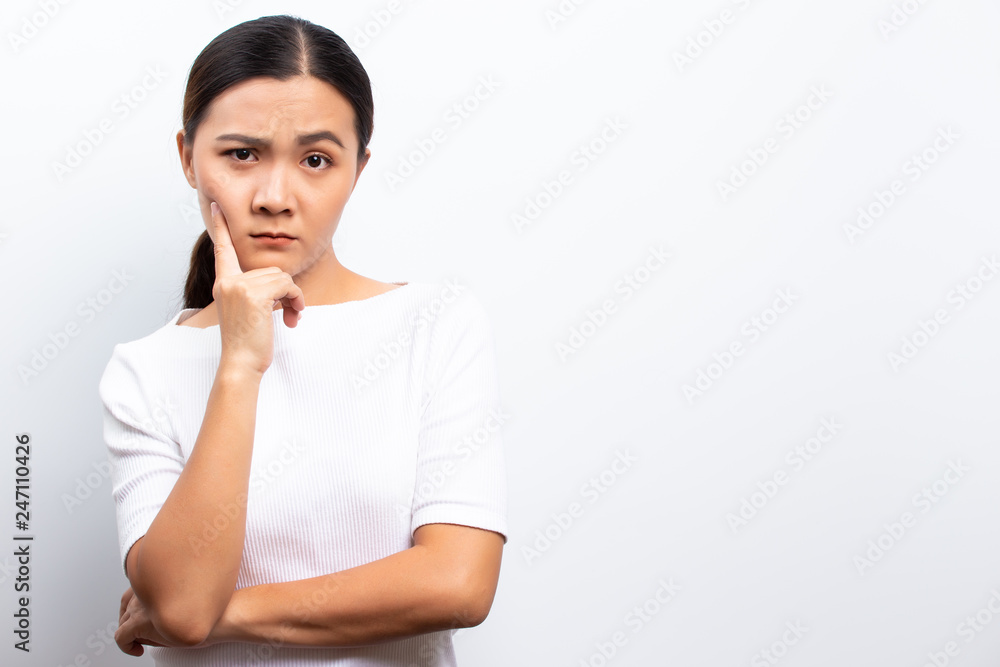 Angry woman standing isolated over white background Angry woman standing isolated over white background