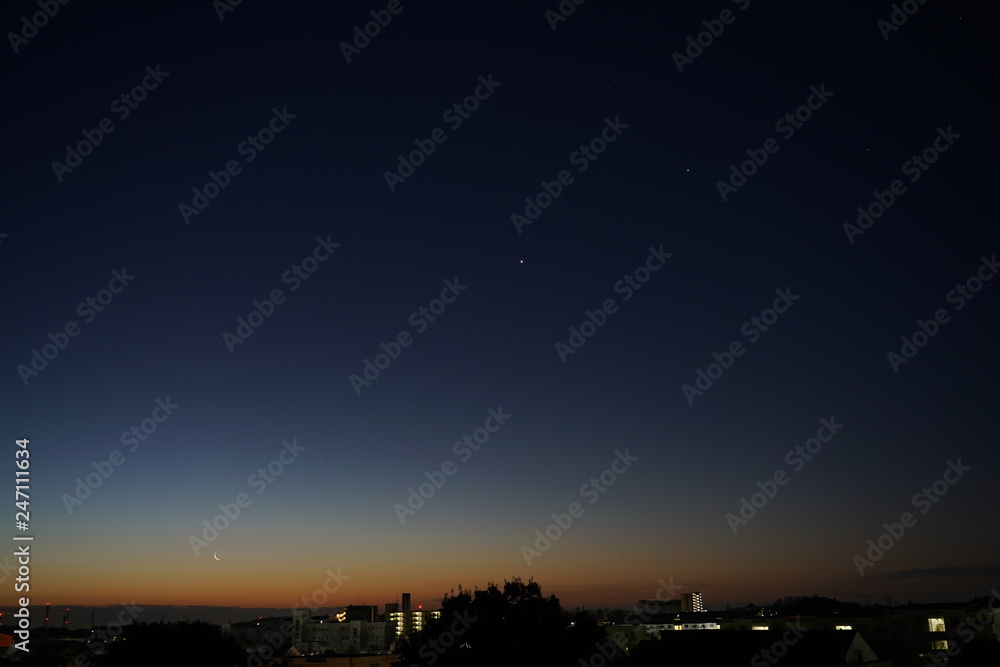 Tokyo,Japan-February 3, 2019: (from left) The Moon with earthshine, Saturn, Venus and Jupiter at daybreak 
