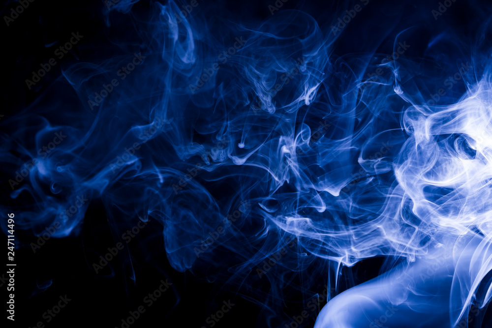 Obraz premium Blue smoke on black background