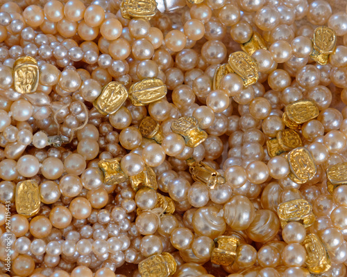 natural pearls neclaces closeup top view, precious background
