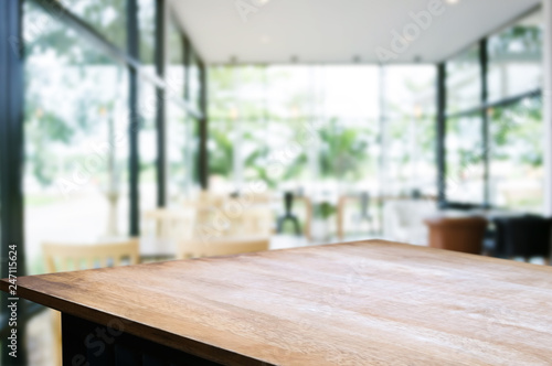 wooden table with blurred modern home background. photo