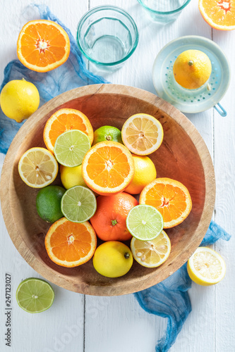 Fototapeta Naklejka Na Ścianę i Meble -  Healthy oranges, limes and lemons with on wooden table