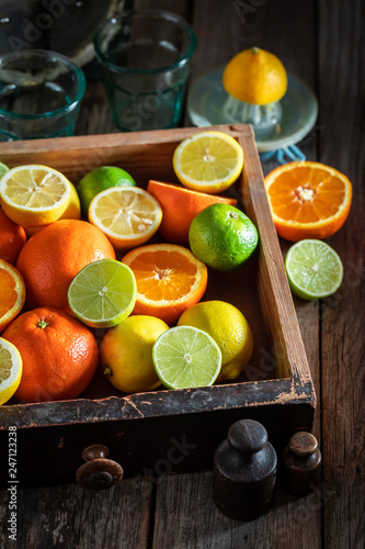Healthy mix of citrus fruits with on wooden table