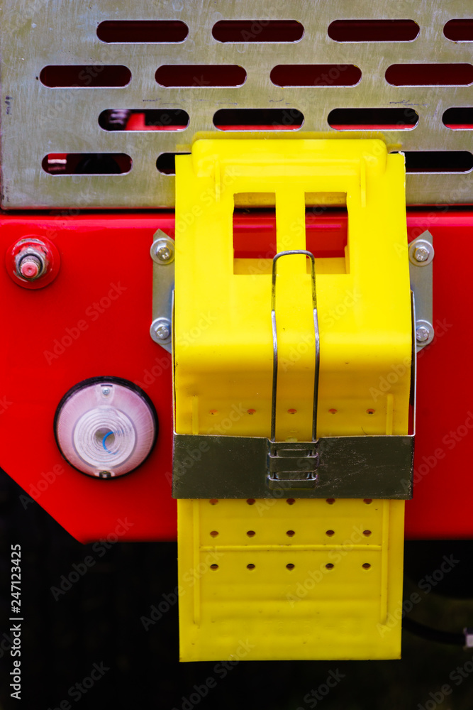 Close up on yellow pin wedge Close up on yellow pin wedge