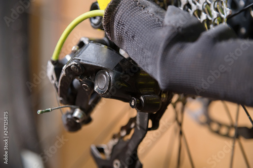 Close-up View of the bike in repair. Gear cassette close-up. Crafting service for mountain bikes. Repair guide for your site